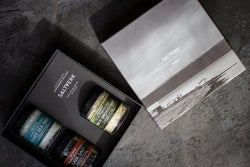 Salt Werk gift set with a black box on a textured surface