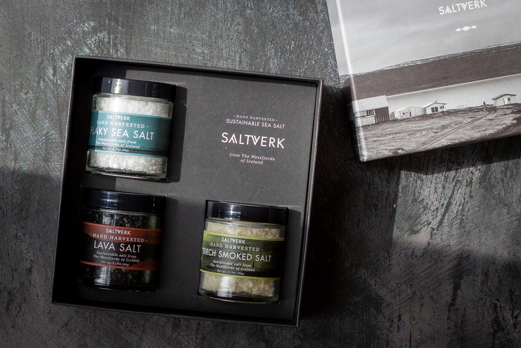 Box of Saltverk salt products on a dark surface with a blurred background