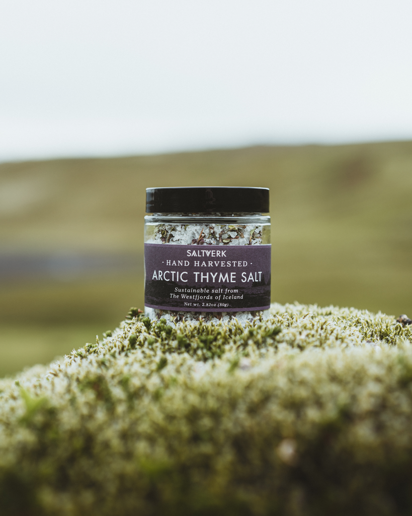 Jar of Arctic Thyme Salt on a mossy background